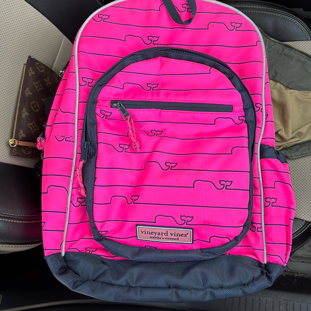Pink vineyard vines back pack has a few stains since it has been used